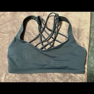 Teal/greenish colored Lululemon sports bra